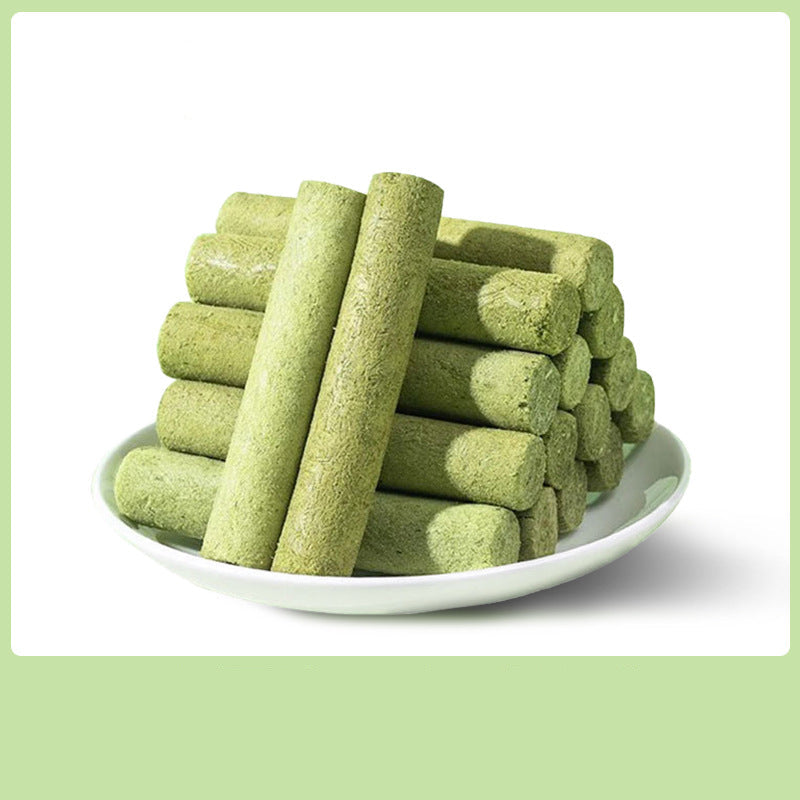 Green Cat Grass sticks on a white plate with text on a green background