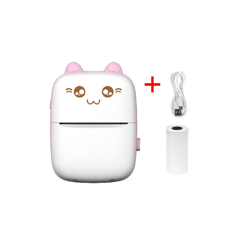 White electronic mini printer device with cartoon face and pink ears, including a cable and additional component on a white background.